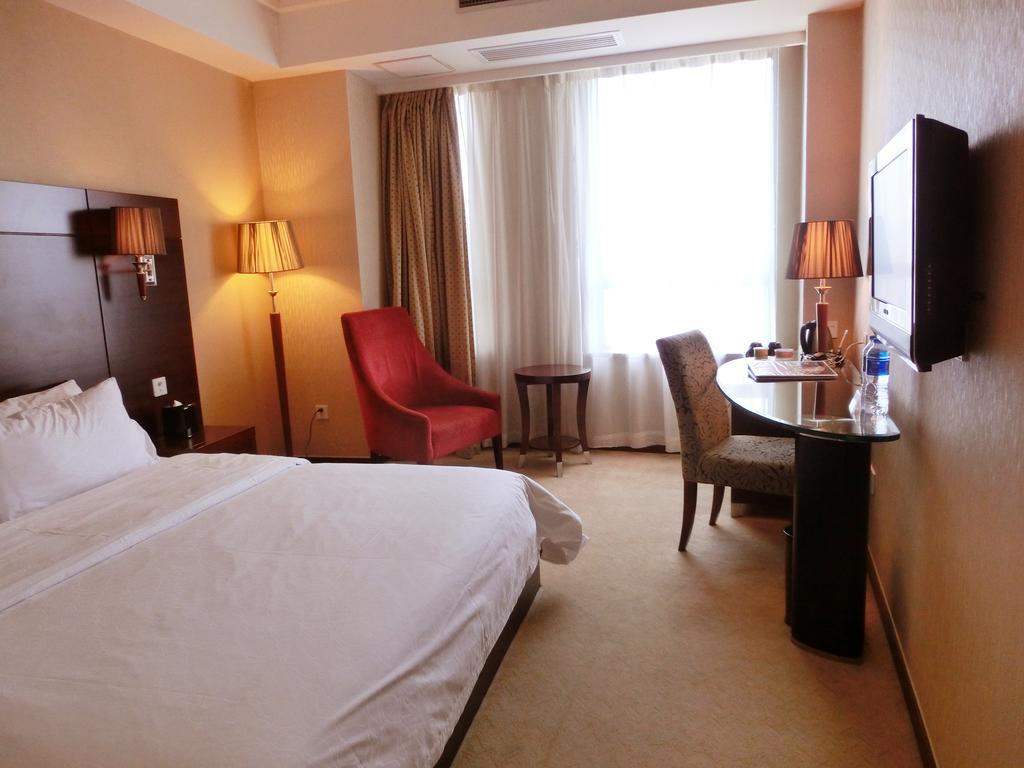 Ramada Shanghai Wujiaochang Номер фото